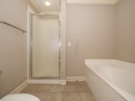 Master Bath with Shower/Tub Combo at 302 North Shore Place